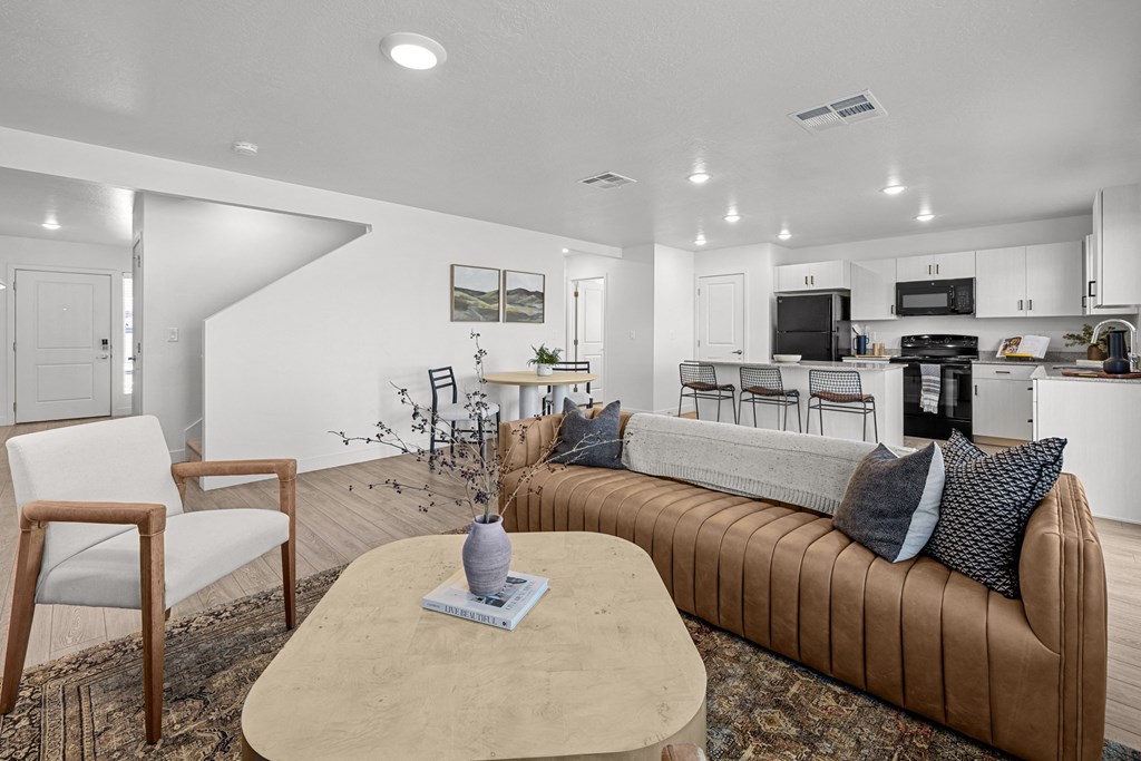 a living room with a couch and a table