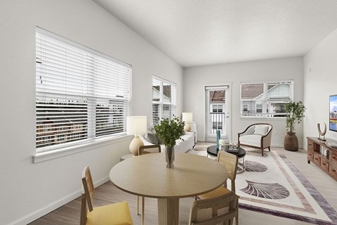 Element 170 Apartments Beaverton   A dining room with a round table and chairs.