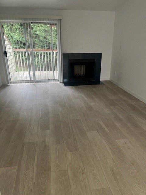 Elevate Apartments in Lynwood, Washington Living Room with Fireplace