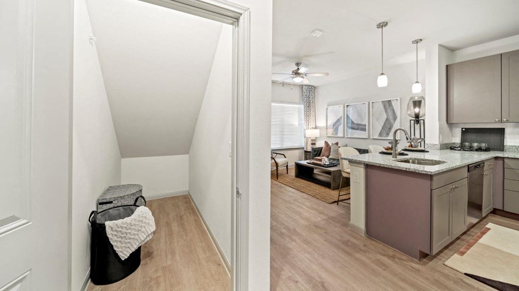 Emerson at Leander Model Living Room and Kitchen with Storage Closet