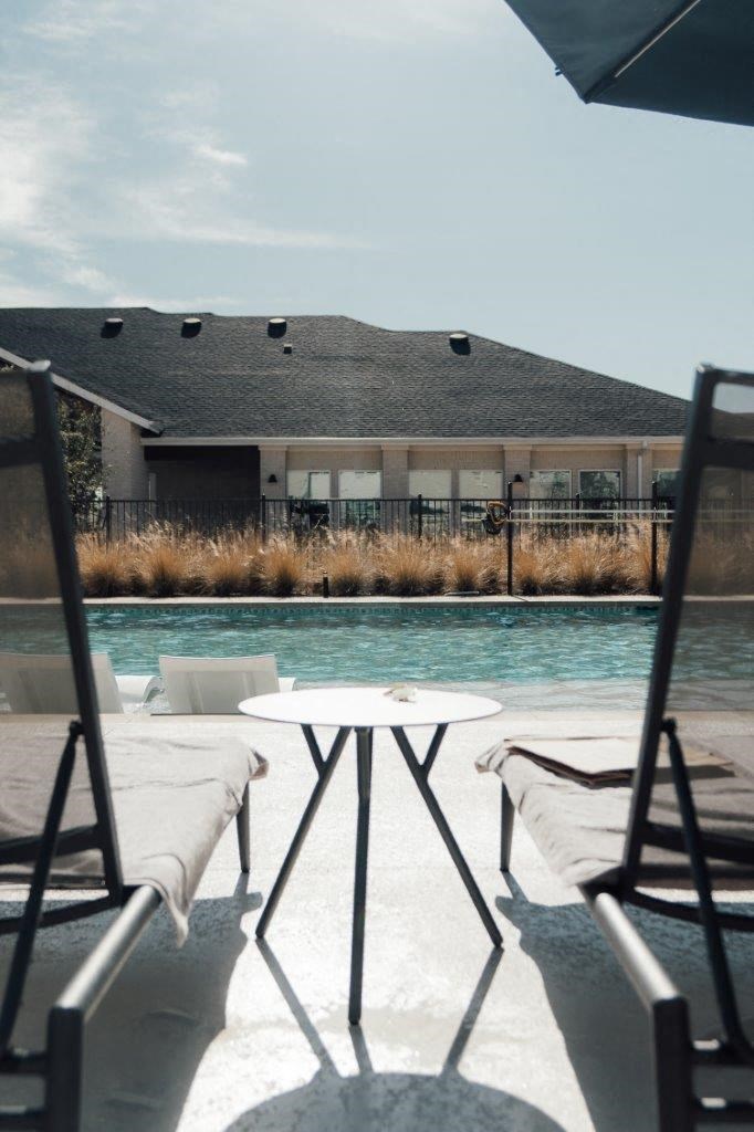 Emerson at Leander Apartments in Leander, Texas Pool with Lounge Chairs