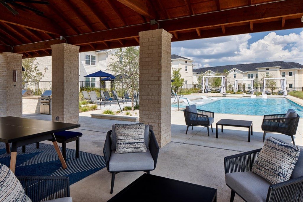 Emerson at Leander Pool with Lounge Chairs and Covered Patio