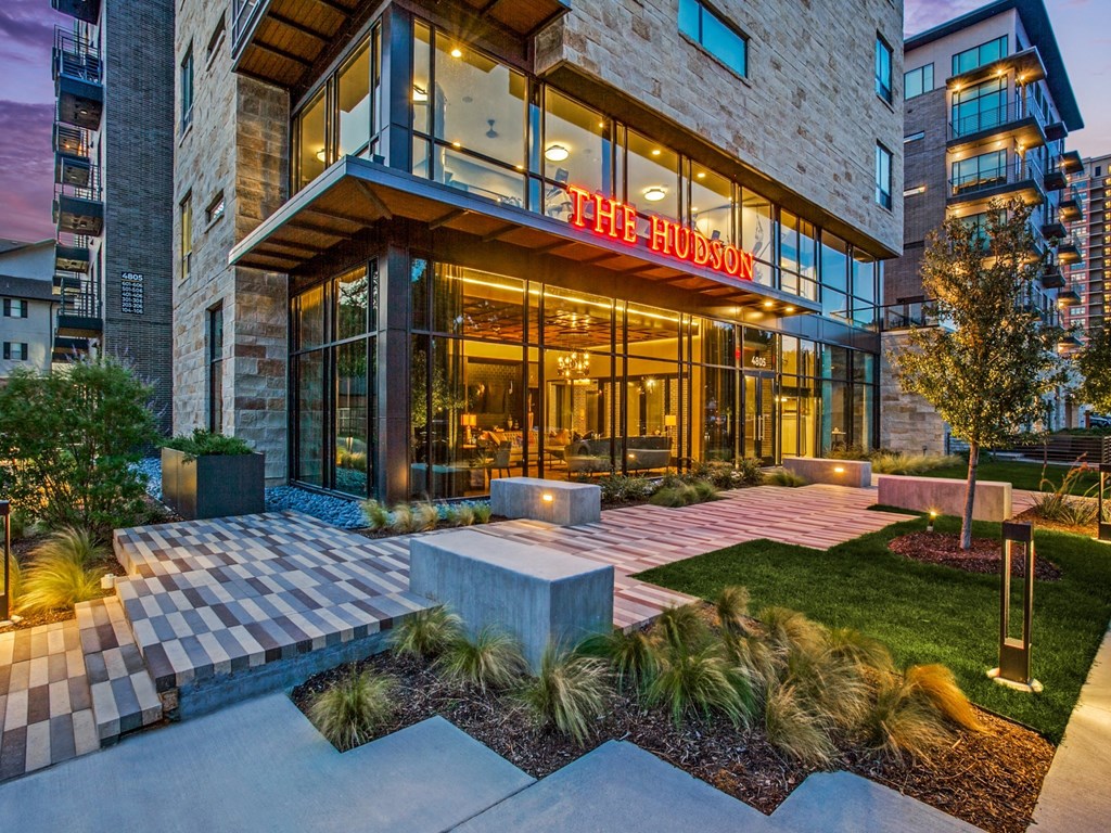 a photo of the outside of the fusion building at night