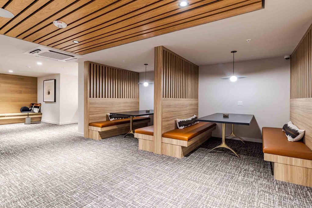 A room with wooden panels on the walls and ceiling.