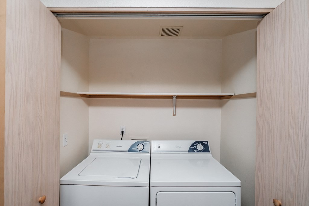 a washer and dryer in a laundry room