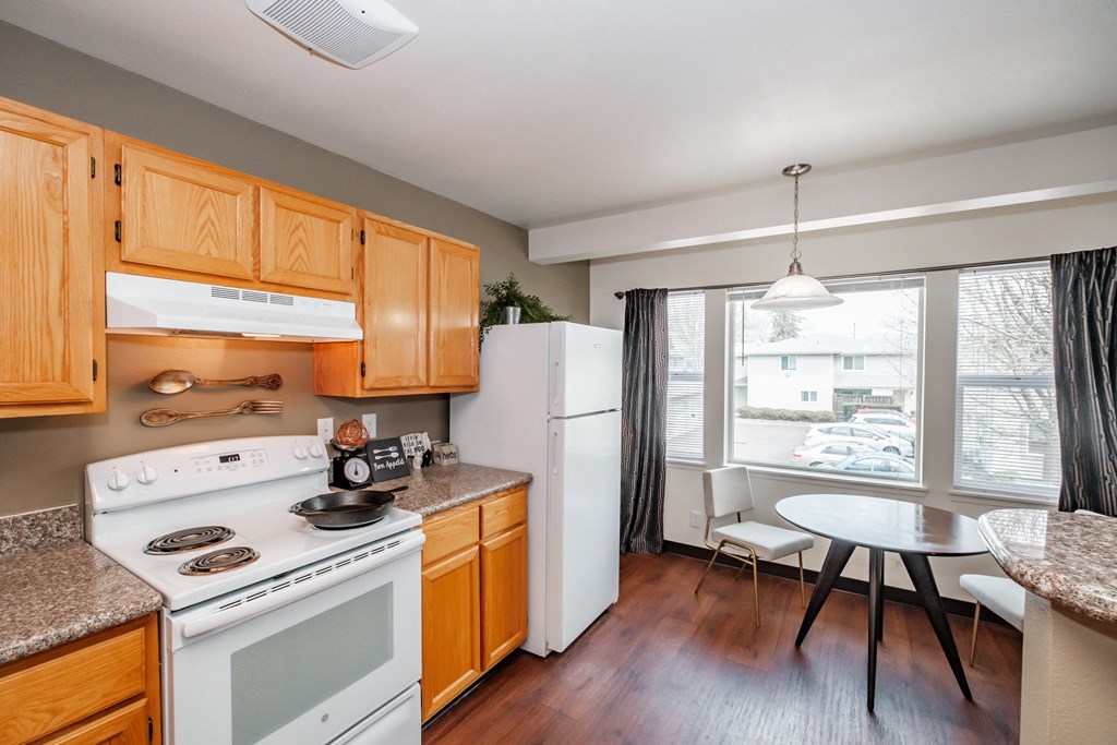 a kitchen and dining area at Brentwood Estates
