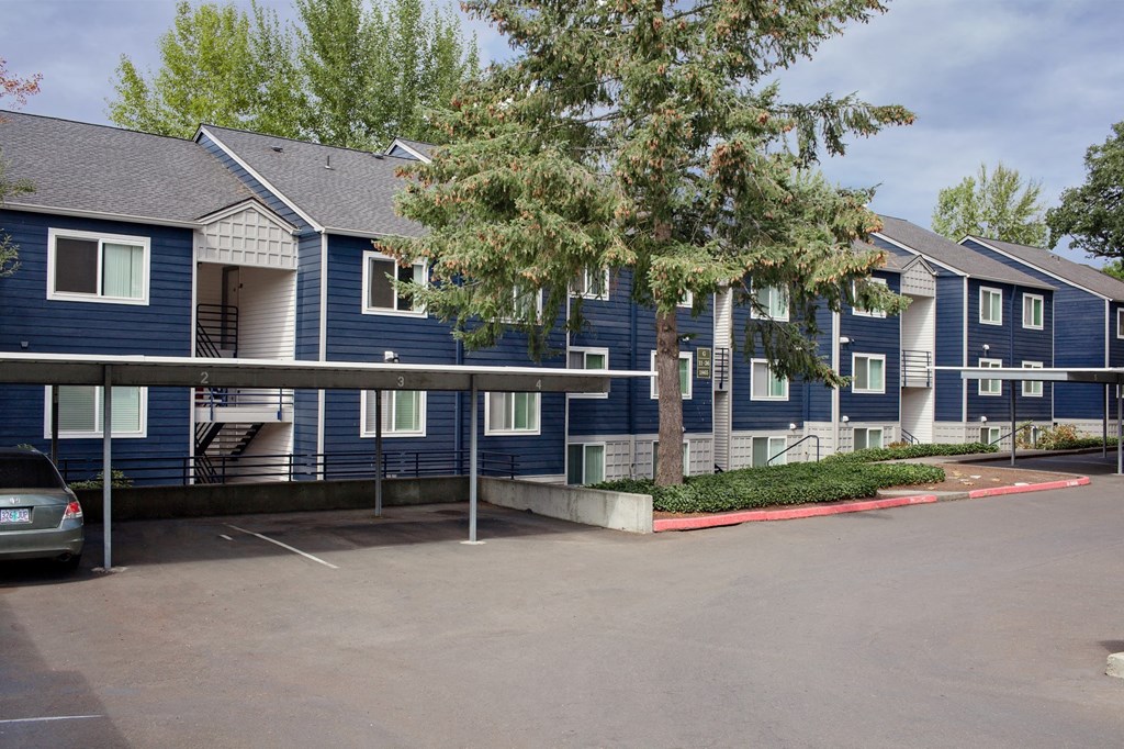 Clermont Exterior View of Apartments and Covered Parking Spaces
