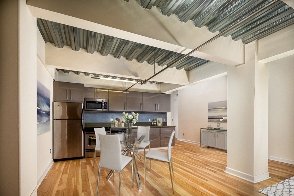 a view of the kitchen and dining area from the living room