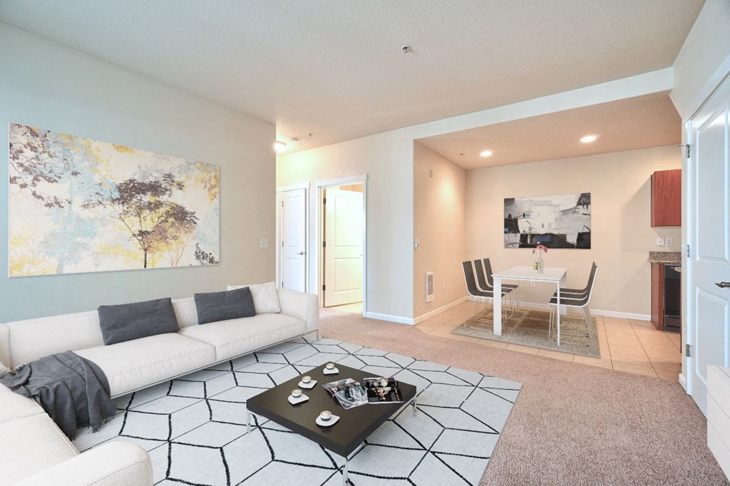 a living room with a couch and a table