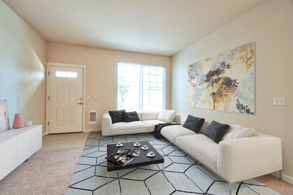 a living room with two couches and a coffee table