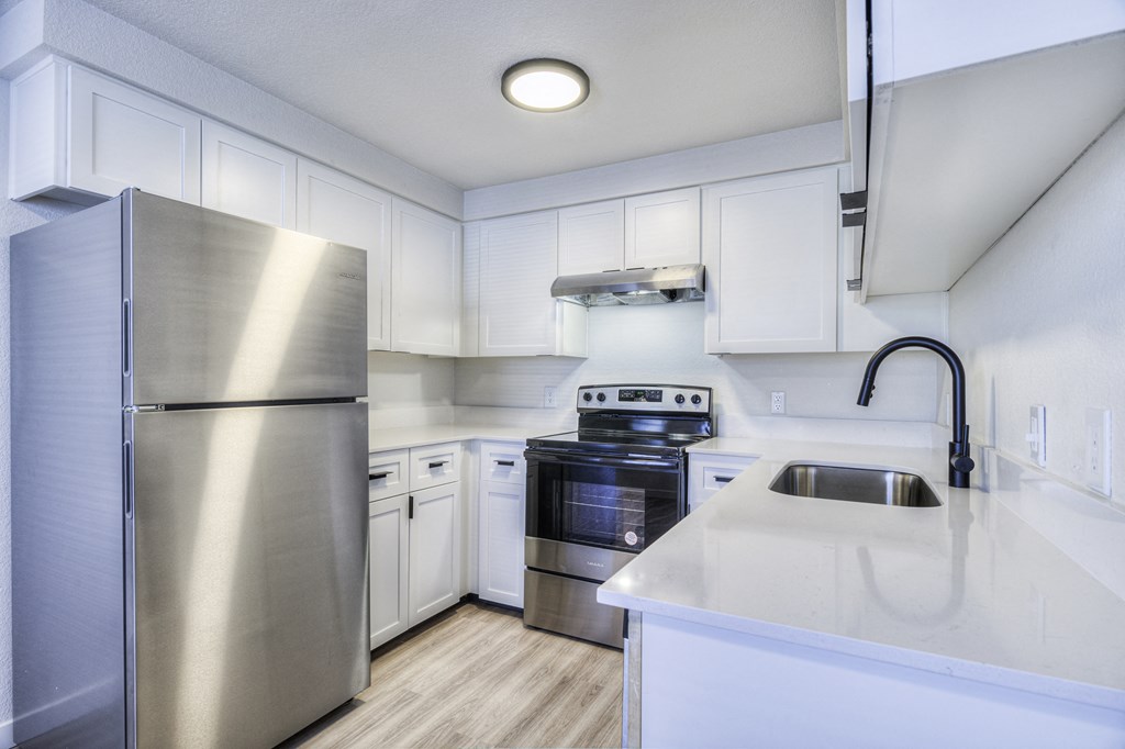 the preserve at ballantyne commons apartment kitchen with stainless steel appliances