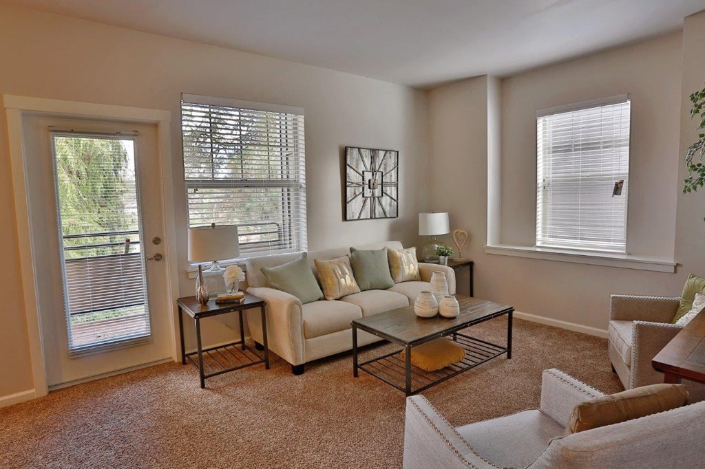 a living room with a couch and a table