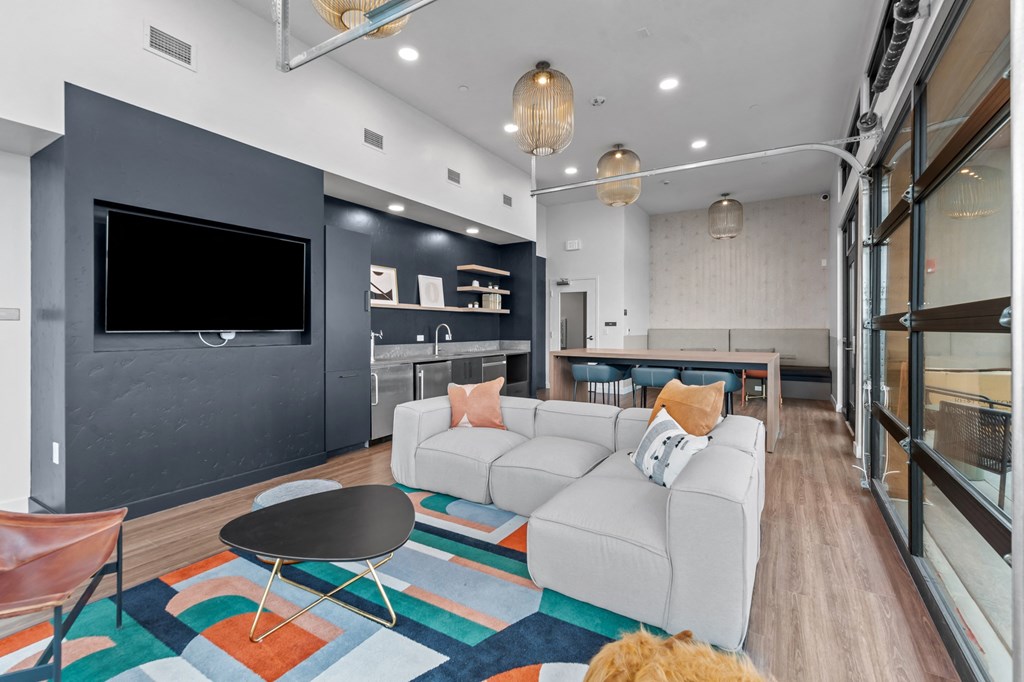 a living room with a couch and a tv