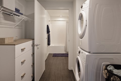 Grant Park Village closet with washer and dryer leading to bathroom