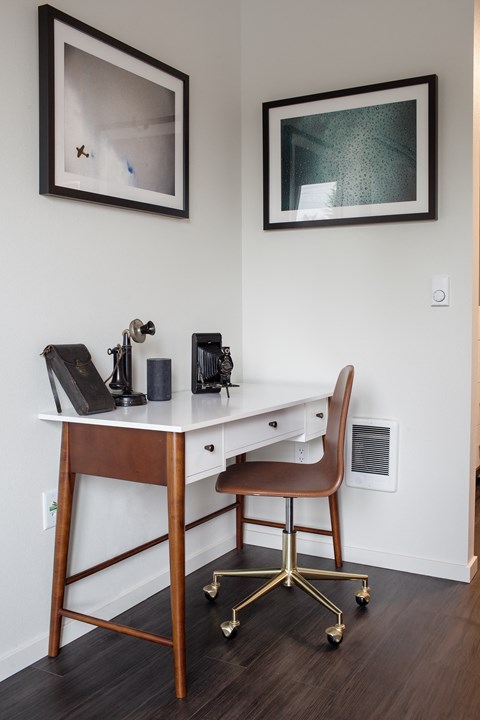 Grant Park Village desk with paintings on walls