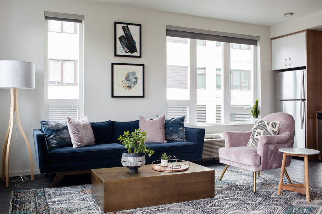 Grant Park Village living room shot of couches with kitchen