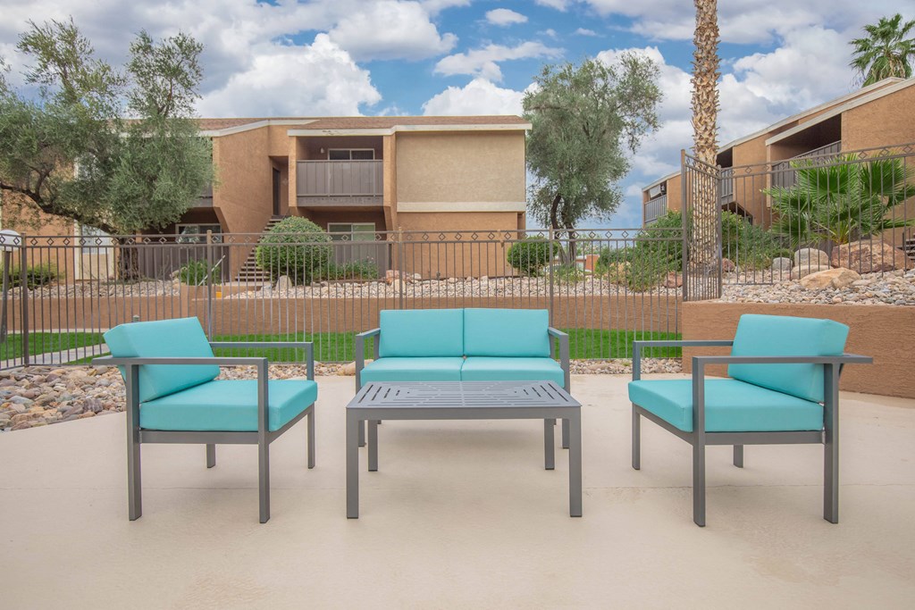 A set of outdoor furniture is placed on a patio.