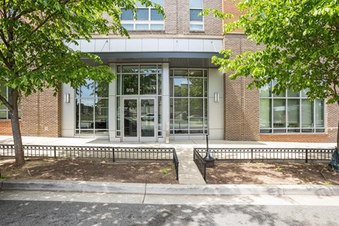 A building with a glass door and the number 018 on it.