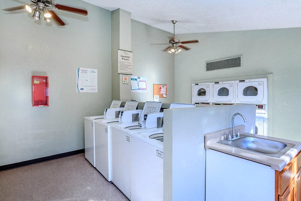 A laundry room with a washer and dryer.