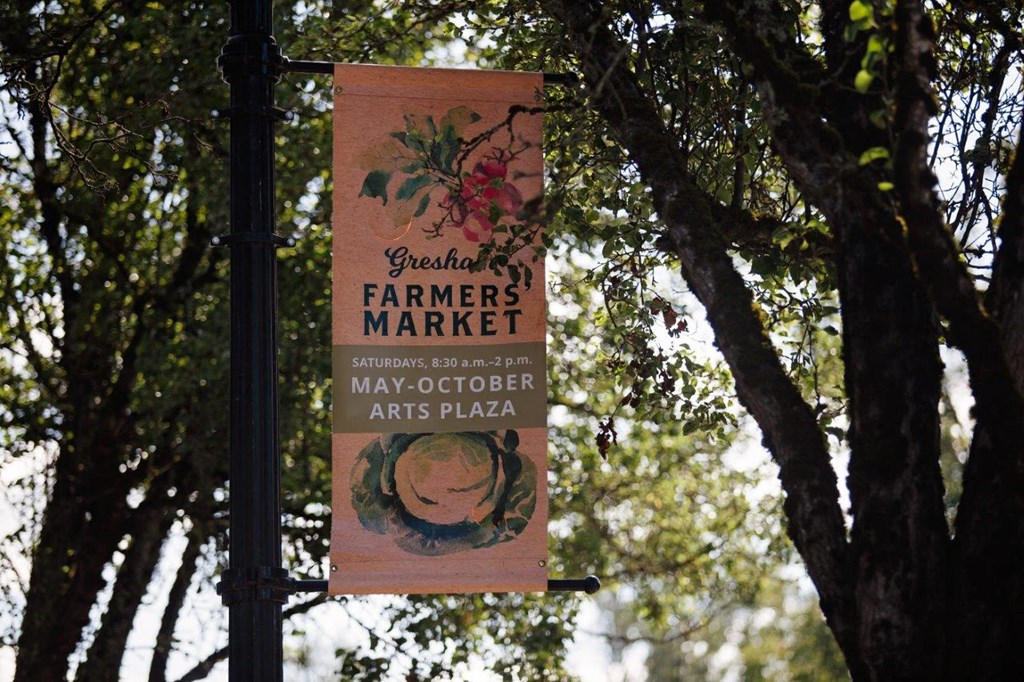 Springwater Crossing exterior farmers market sign