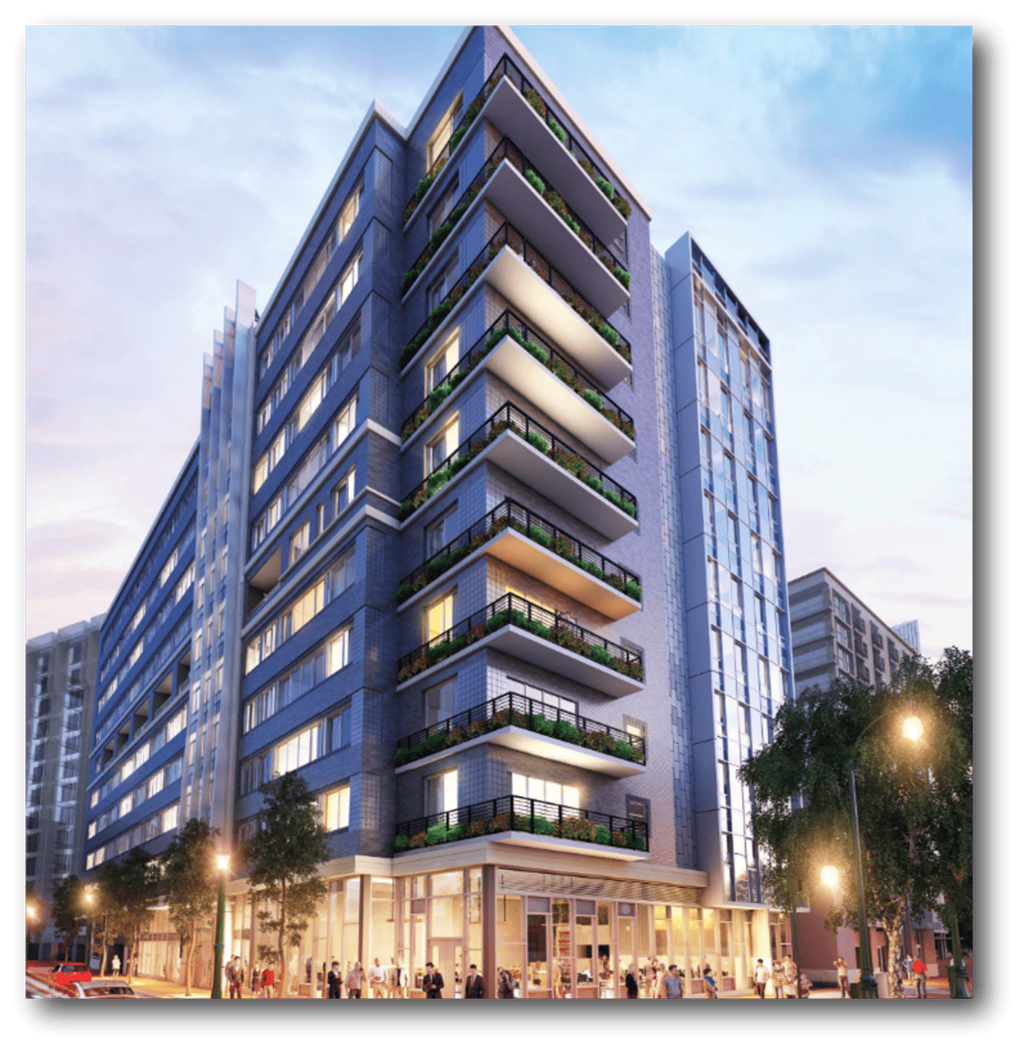 A tall building with balconies on the second and third floors.