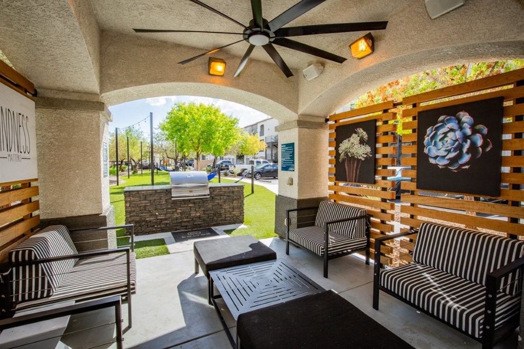 Colton Apartments covered pavilion with seating and BBQ