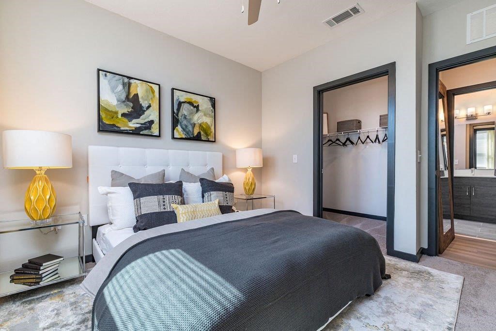 a bedroom with a bed and a closet