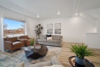 a living room with two couches and a coffee table - Photo Gallery 6