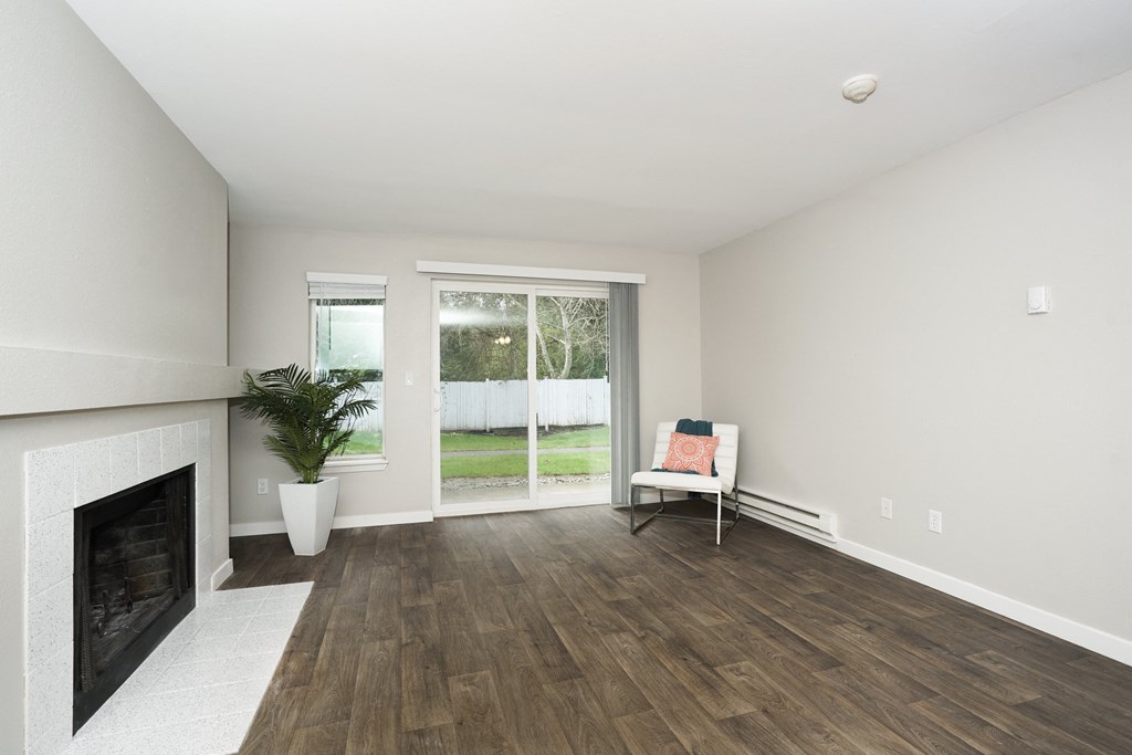 Novela Apartments Living Space Slider Door to back yard