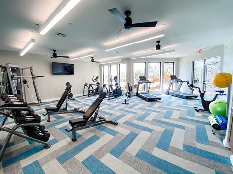 Fitness Center with Weights and Cardio Machines at Presidio at River East, Texas