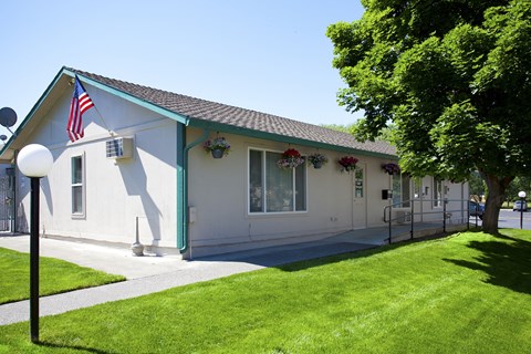 Towers Apartments Exterior Building with Greenery
