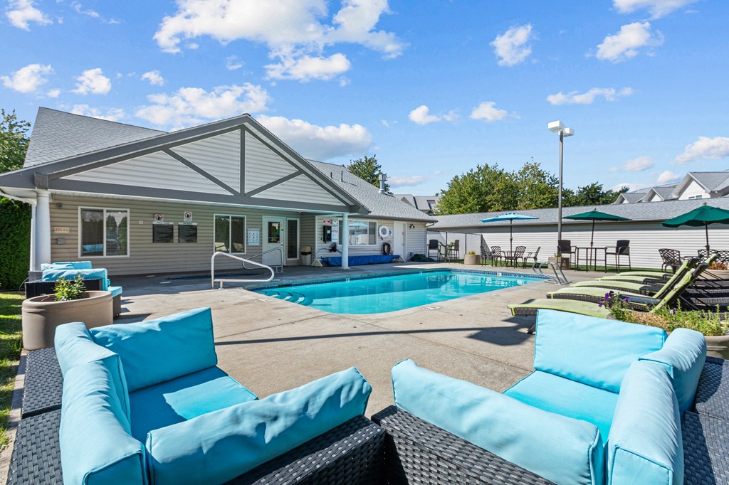 our apartments have a pool and lounge furniture