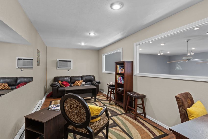a living room with a couch and a chair