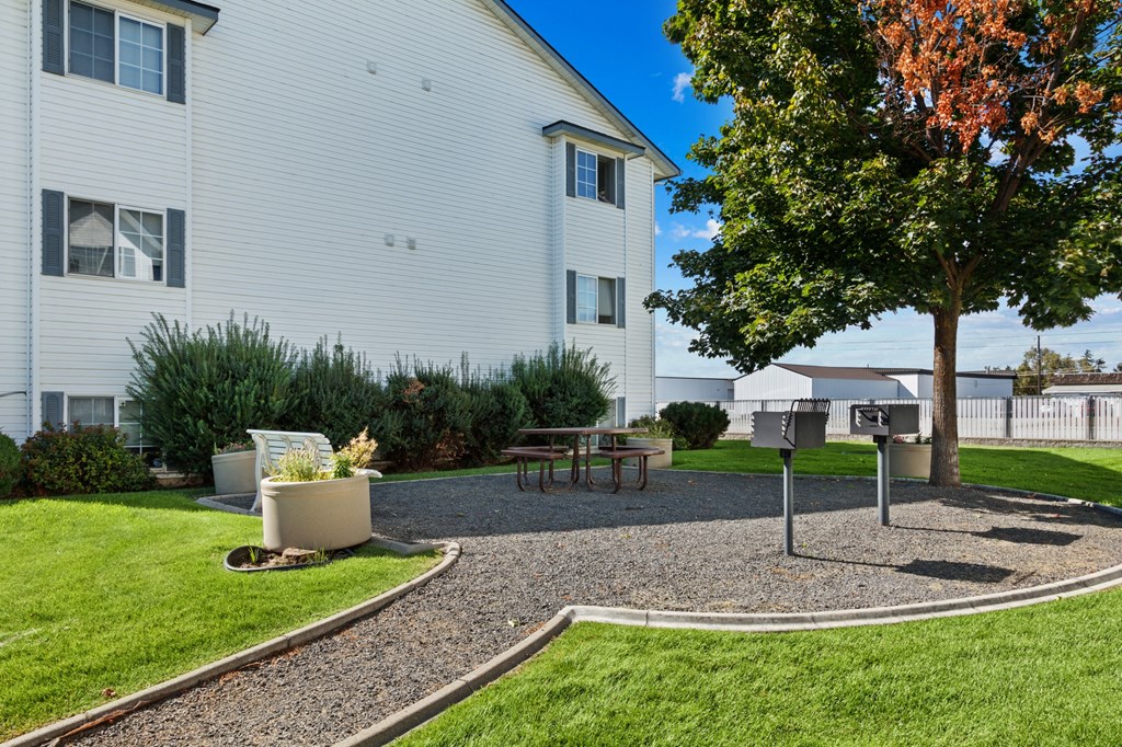 Farr Court Exterior Building Green Grass and Grilling Area