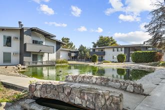 Lakeside Apartments exterior buildings Lakeside Apartments exterior pond and bridge - Photo Gallery