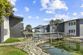 Lakeside Apartments exterior and bridge Lakeside Apartments exterior and bridge - Photo Gallery