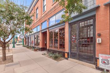 A brick building with a sign that says "Tucson Chinese Garden".