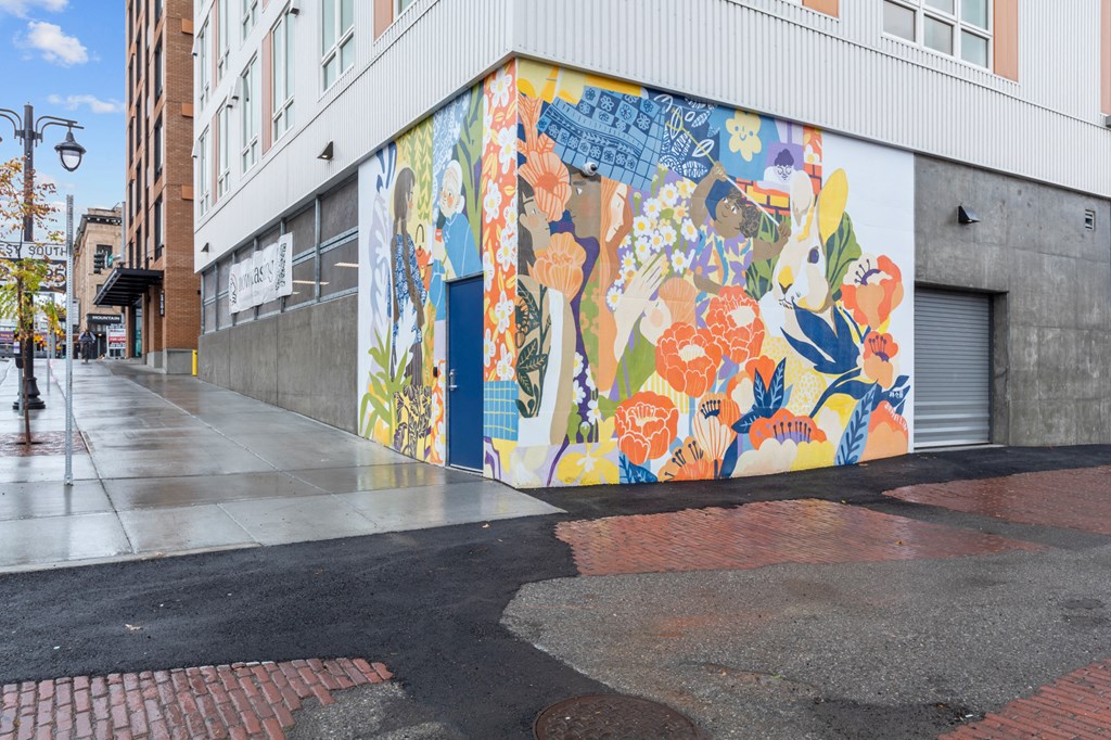 The Warren Apartments Exterior Sidewalk and Wall Mural