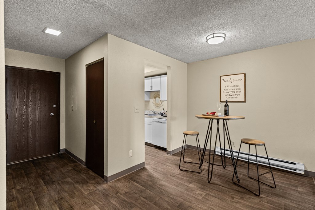 Cedar North Apartments dining room and view of kitchen