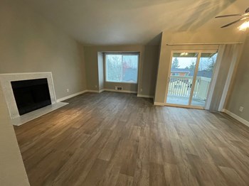 Aspire Apartments at Mountlake Terrace Livingroom with Patio - Photo Gallery 3