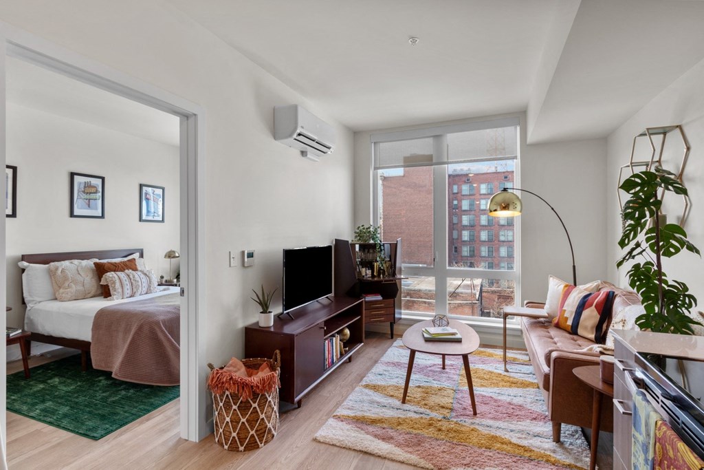 The Warren Model Living Room and View into Bedroom