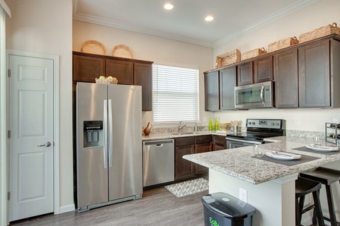 Horizon at Premier Apartments Model Kitchen with Stainless Steel Appliances and Breakfast Nook.