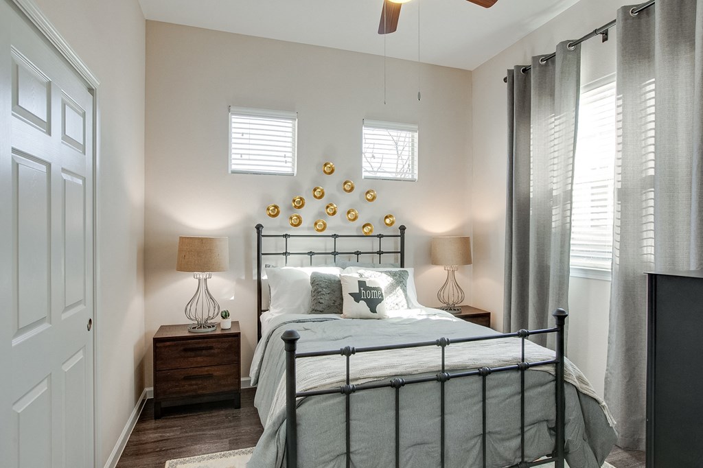 Horizon at Premier Apartments Model Bedroom with Large Window and Two accent windows.