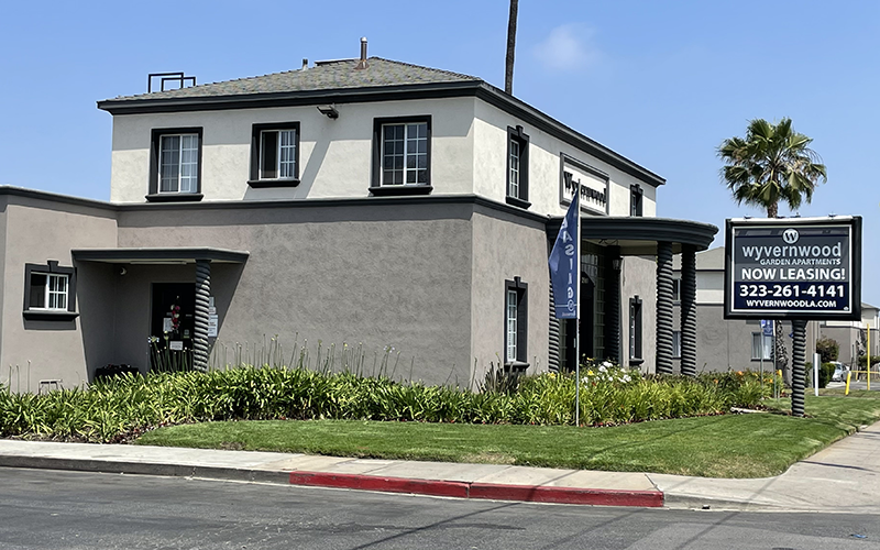 a house with a sign in front of it
