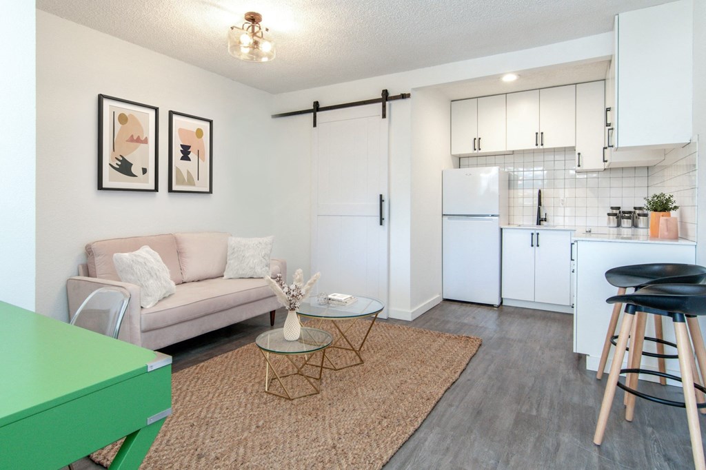 a living room with a couch and a table