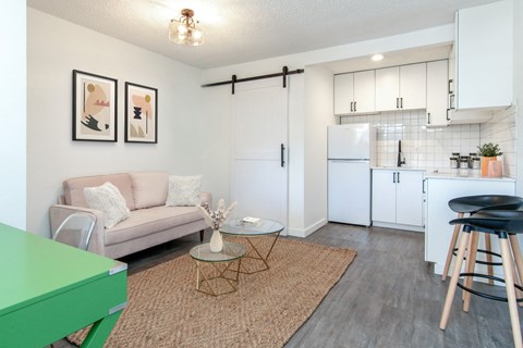 a living room with a couch and a table