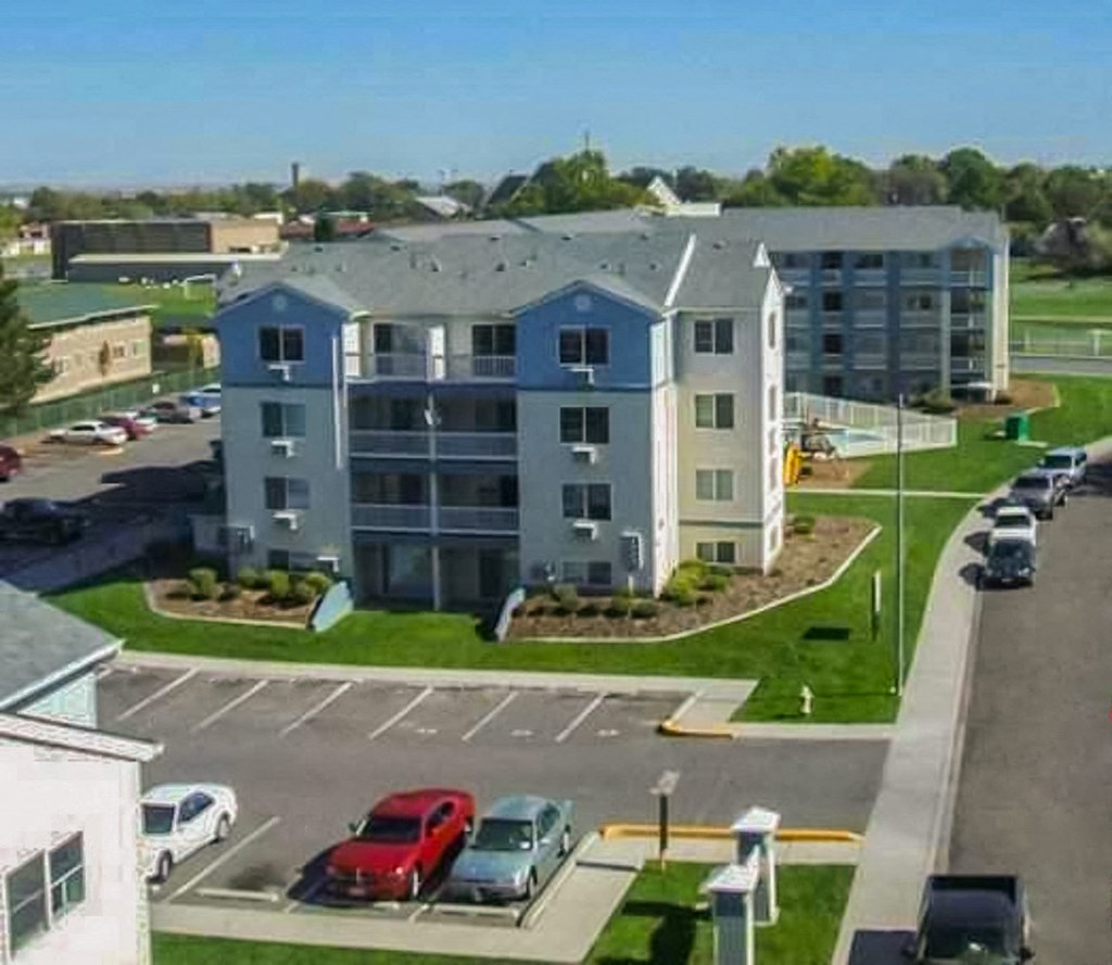 Kent Manor Apartments Exterior Building and Parking Lot
