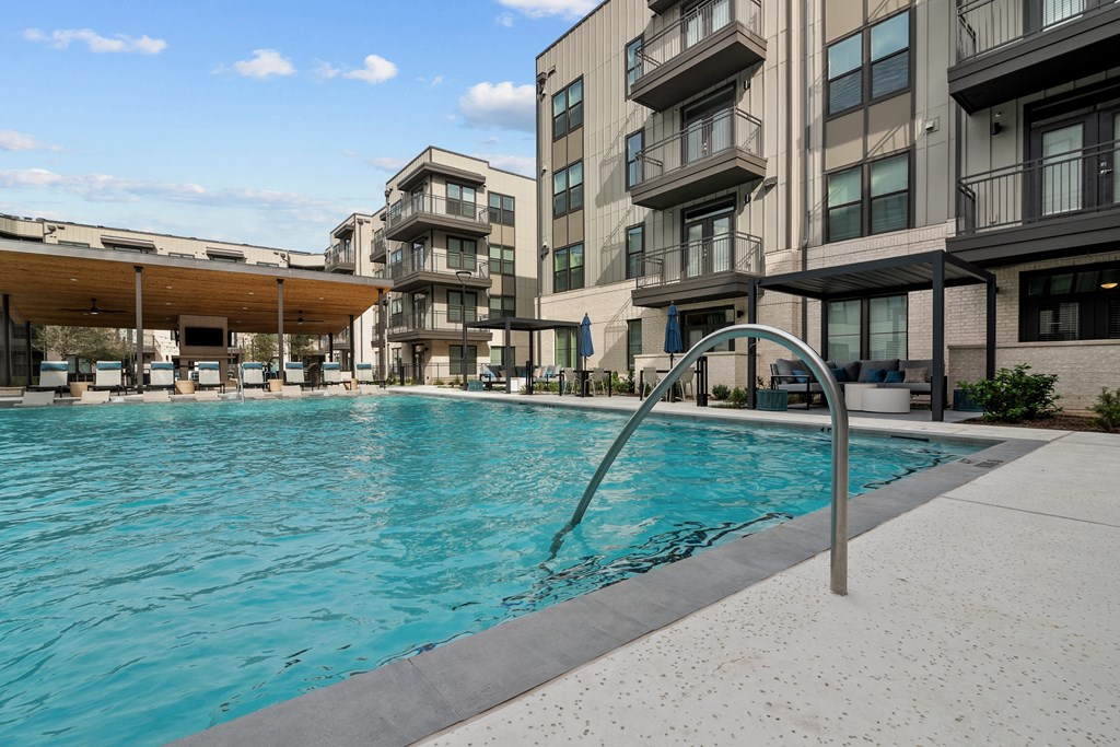 the swimming pool at the grove apartments
