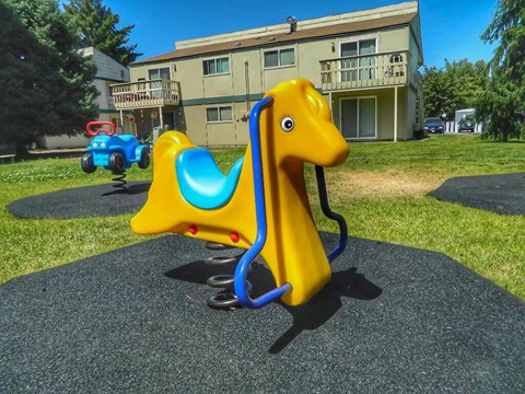La Verde Apartments Outdoor Playground with Spring Riders