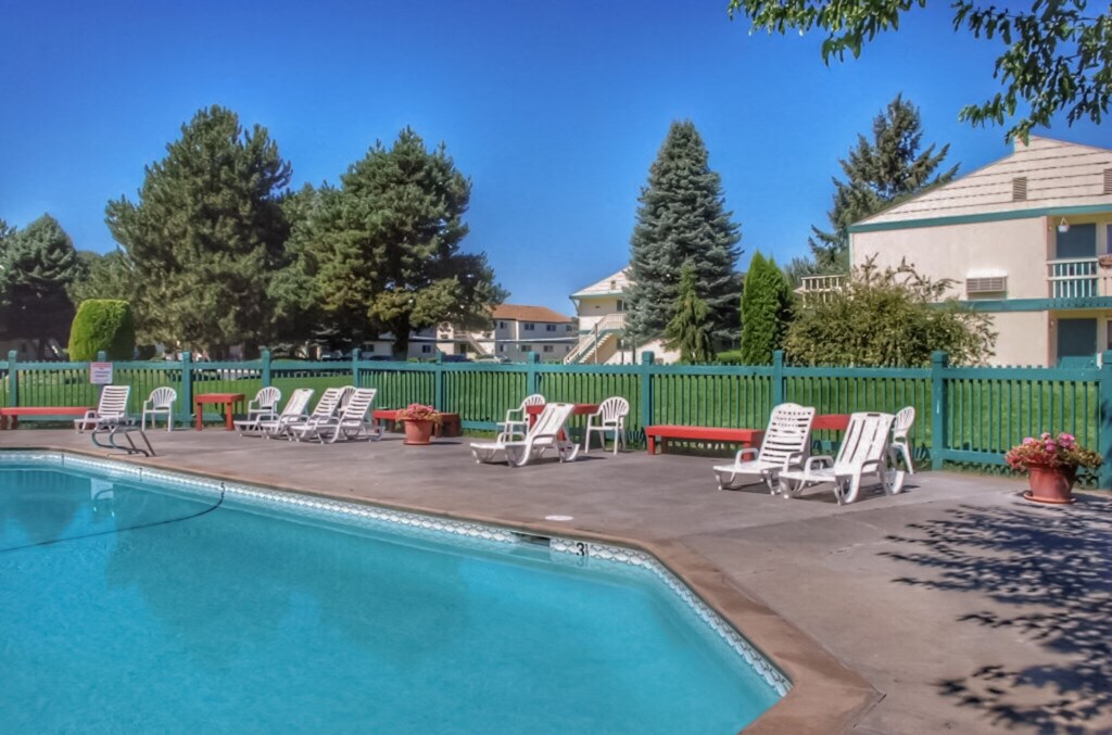 La Verde Apartments Pool Area with Lounge Chairs
